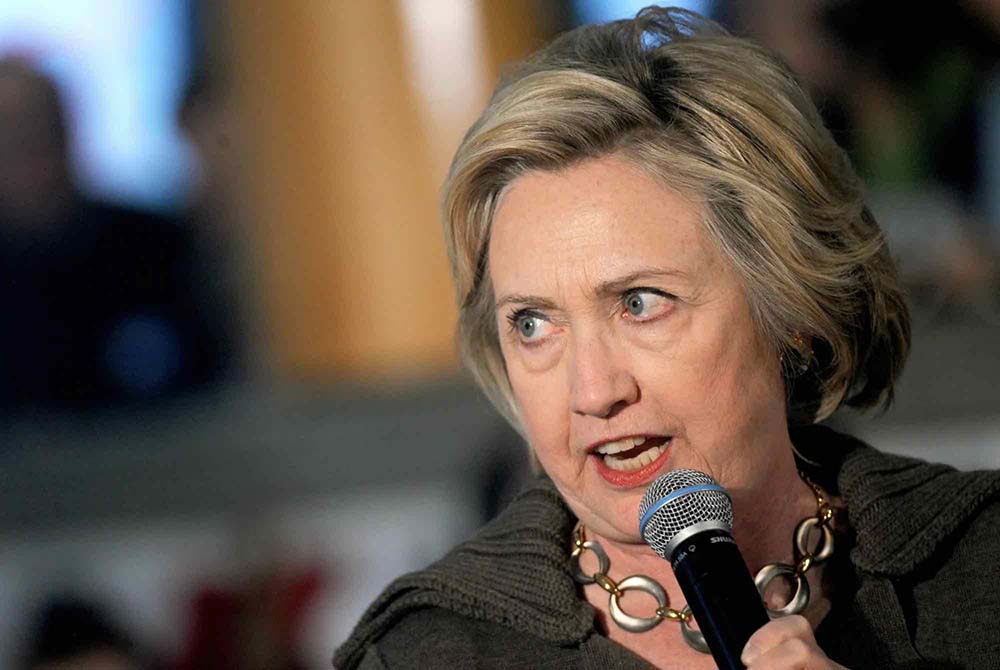 ‘Most beloved war criminal’: Protesters await Hillary Clinton visit to alma mater Wellesley College